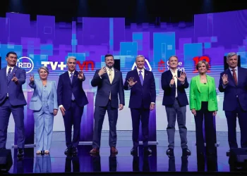 Los candidatos luego del último debate/AFP
